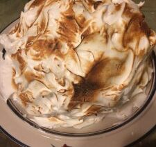 Baked Alaska dessert with toasted meringue topping.