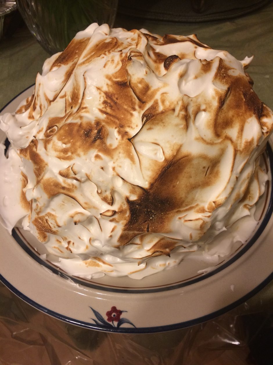 A beautifully toasted meringue topping on a dessert.