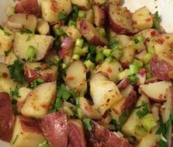 Potato salad with herbs and spices.