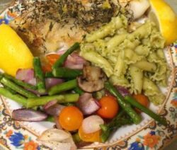 Herb chicken with pasta and mixed vegetables.