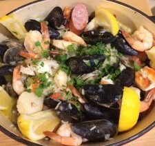Seafood platter with lemon and herbs.