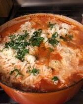 Cheesy tomato soup with fresh herbs.