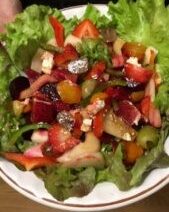 Colorful mixed salad with fresh vegetables.
