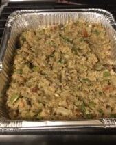 Aluminum tray with seasoned rice dish.