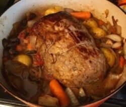 Roast with vegetables in a pot.