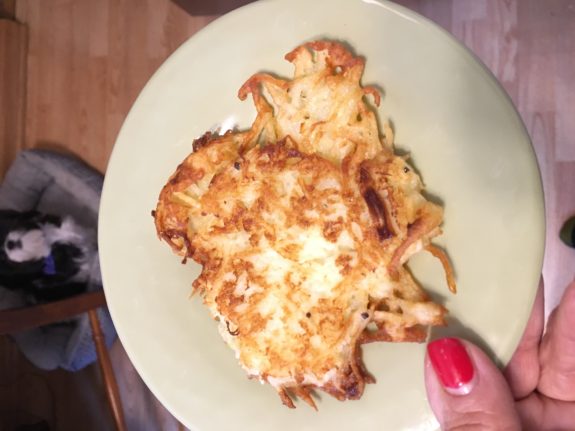 A plate of crispy, golden hash browns.