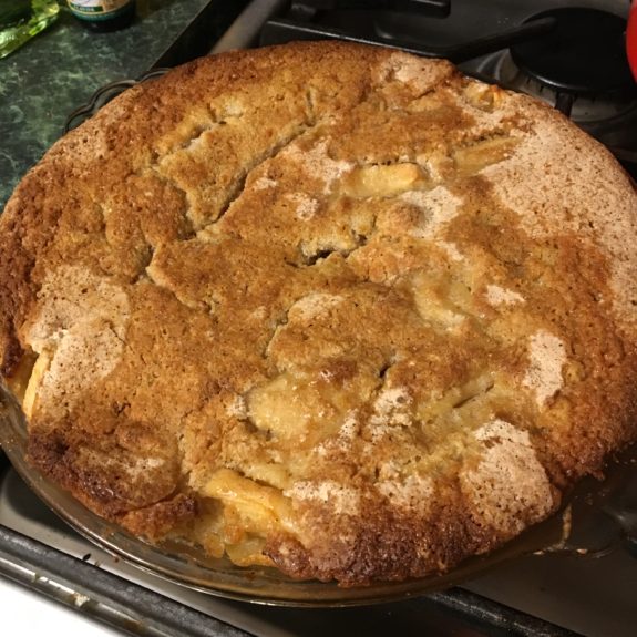 Golden-brown homemade apple pie fresh out of the oven.