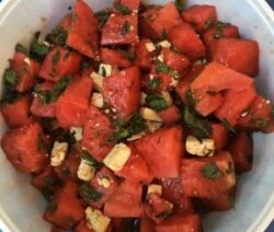 Watermelon salad with feta and herbs.