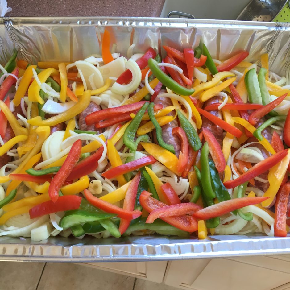 Colorful sliced bell peppers in a tray.
