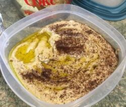 Homemade hummus with olive oil and spices.