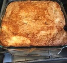 Baked dessert in a glass dish.