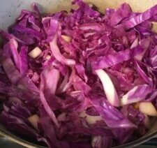 Chopped purple cabbage in a pot.