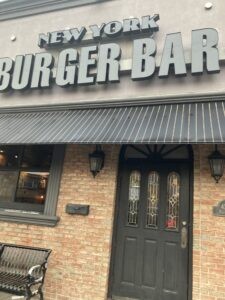 New York Burger Bar entrance with signage.